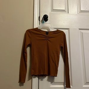 long sleeved brown shirt size L 10/12 art class good condition